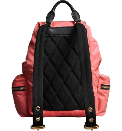 Shop Burberry Medium Rucksack Nylon Backpack - Coral In Bright Coral Pink