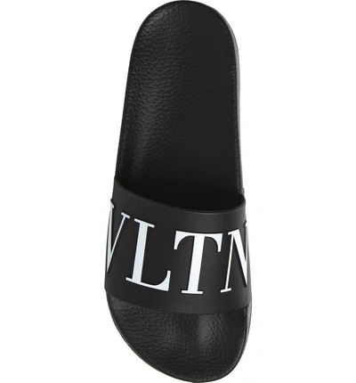 Shop Valentino Slide Sandal In Nero/ Bianco