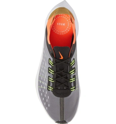 Shop Nike Exp-x14 Running Shoe In Black/ Volt