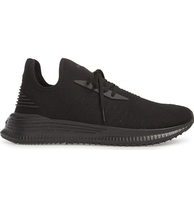 Shop Puma Avid Evoknit Sneaker In Black/ Black