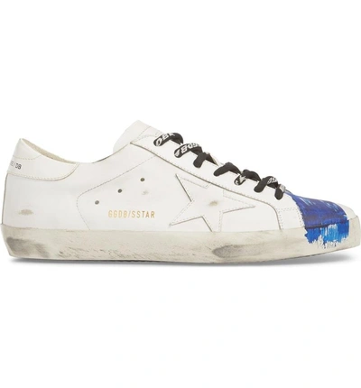 Shop Golden Goose Superstar Distressed Sneaker In White-blue Stripe