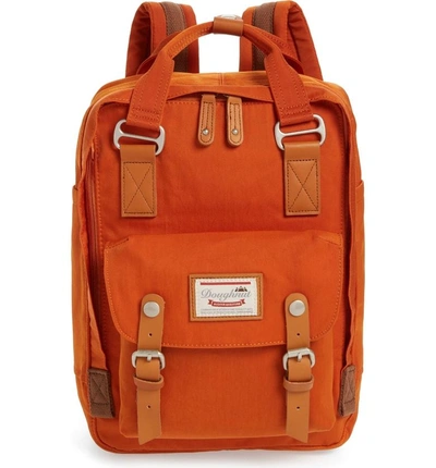 Shop Doughnut Macaroon Water Resistant Backpack - Orange In Rust