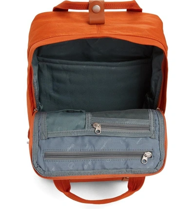 Shop Doughnut Macaroon Water Resistant Backpack - Orange In Rust