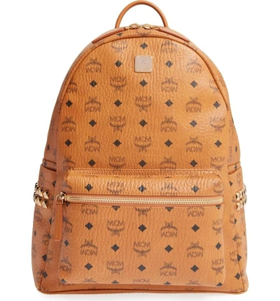 Shop Mcm Medium Stark Visetos Studded Backpack In Cognac