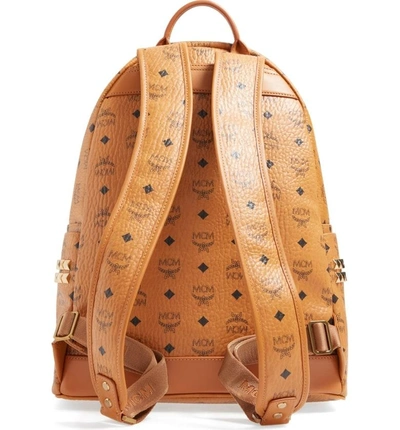 Shop Mcm Medium Stark Visetos Studded Backpack In Cognac