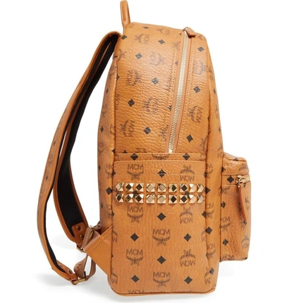 Shop Mcm Medium Stark Visetos Studded Backpack In Cognac