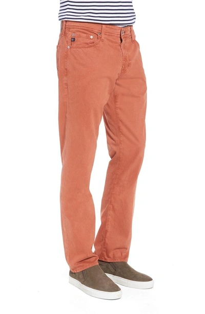 Shop Ag Graduate Sud Slim Straight Leg Pants In Sulfur Rosso Red