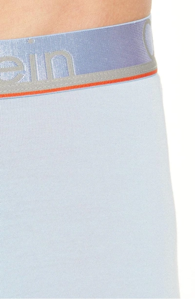 Shop Calvin Klein 3-pack Comfort Microfiber Boxer Briefs In Rapid Blue/ Blue/ Oriole