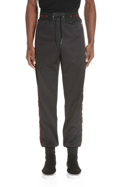 Shop Givenchy Piped Track Pants In Black