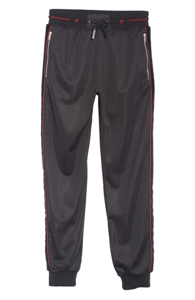 Shop Givenchy Piped Track Pants In Black