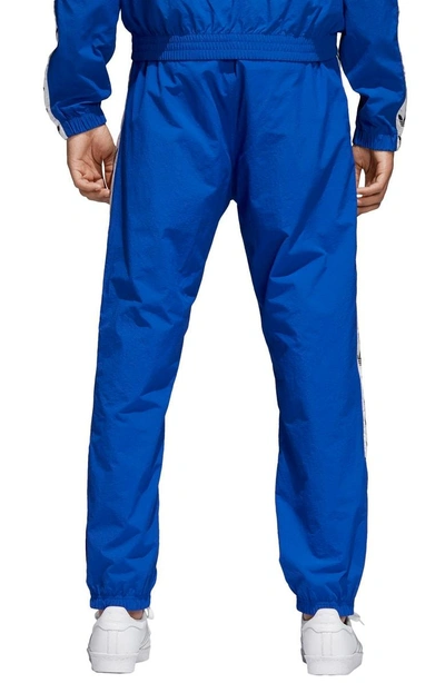 Shop Adidas Originals Tnt Wind Pants In Boblue