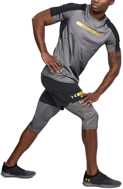 Shop Under Armour Perpetual Fitted Shorts In Black/ Metallic Victory Gold