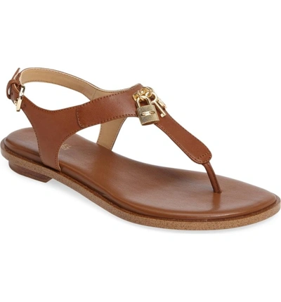 Shop Michael Michael Kors Suki T-strap Charm Sandal In Luggage Leather