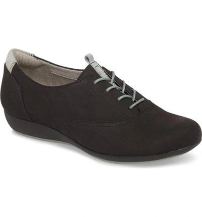 Shop Dansko Kimi Wedge Sneaker In Black Milled Nubuck Leather