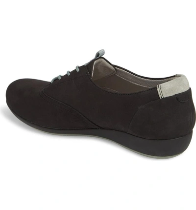 Shop Dansko Kimi Wedge Sneaker In Black Milled Nubuck Leather