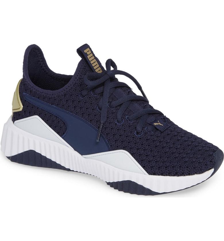 blue and gold tennis shoes