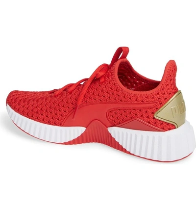 Puma Women's Defy Varsity Knit Lace Up Sneakers In Red | ModeSens