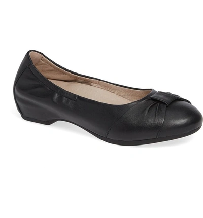 Shop Dansko Lina Bow Pump In Black Leather