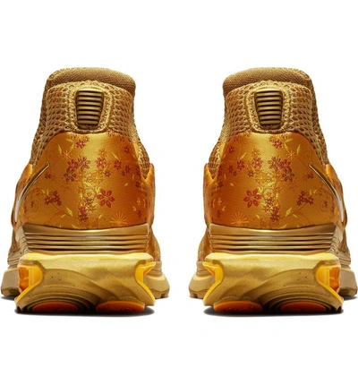 Shop Nike Shox Gravity Sneaker In Metallic Gold/ Metallic Gold
