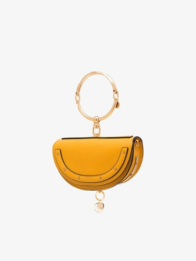 Shop Chloé Yellow Nile Minaudière Leather Bracelet Bag In Gelb&orange
