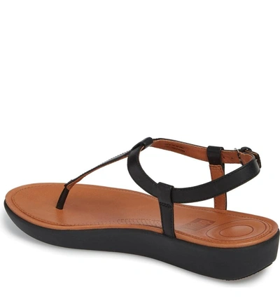 Shop Fitflop Tia Thong Sandal In Black Leather