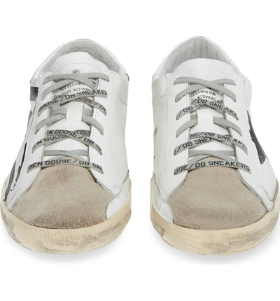 Shop Golden Goose Super-star Low Top Sneaker In White/ Black