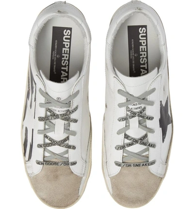 Shop Golden Goose Super-star Low Top Sneaker In White/ Black