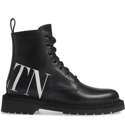 Shop Valentino Vltn Combat Boot In Black/ White