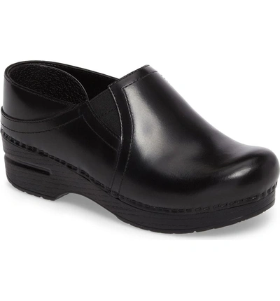 Shop Dansko Pepper Clog In Black Cabrio