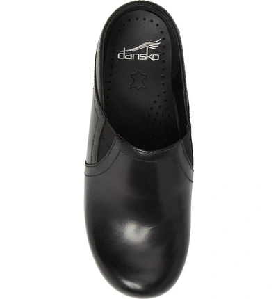 Shop Dansko Pepper Clog In Black Cabrio