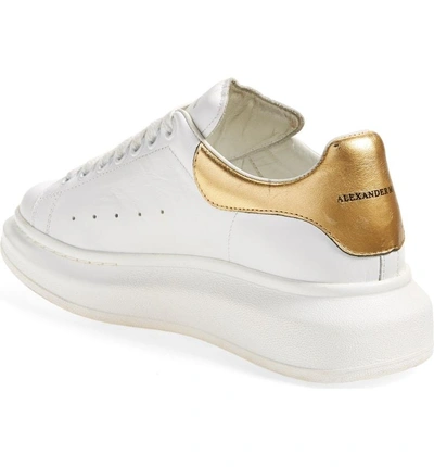 Shop Alexander Mcqueen Sneaker In White/ Gold