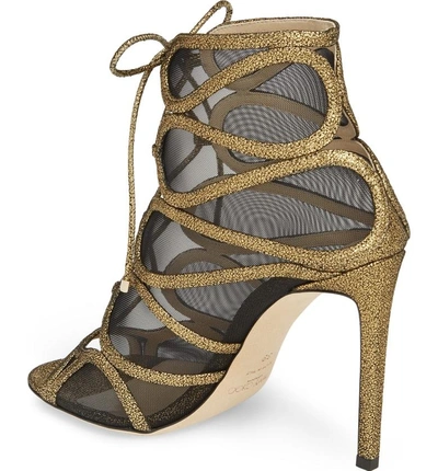 Shop Jimmy Choo Malena Cage Peep Toe Bootie In Gold