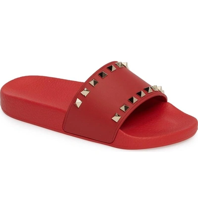 Shop Valentino Rockstud Slide Sandal In Red