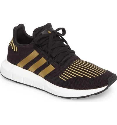 Shop Adidas Originals Swift Run Sneaker In Core Black/ Gold/ White