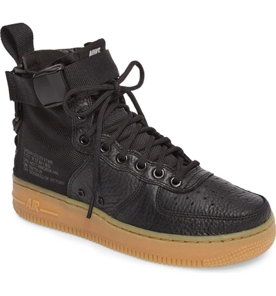 Shop Nike Sf Air Force 1 Mid Sneaker In Black/ Black/ Light Brown