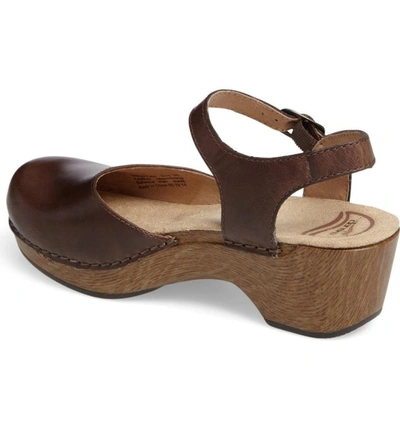 Shop Dansko 'sam' Clog In Teak Vintage Leather