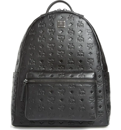 Shop Mcm Ottomar Leather Backpack - Black