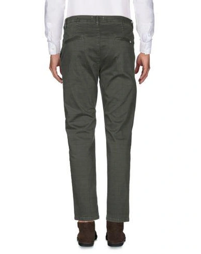 Shop Addiction Casual Pants In Military Green