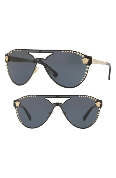 Shop Versace 60mm Shield Mirrored Sunglasses In Pale Gold Solid