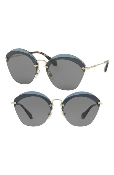 Shop Miu Miu 62mm Sunglasses In Transparent Blue Solid