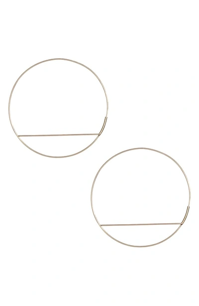 Shop Lana Jewelry Wire Eclipse Hoops In Yellow Gold