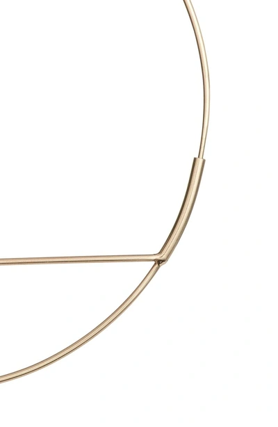 Shop Lana Jewelry Wire Eclipse Hoops In Yellow Gold