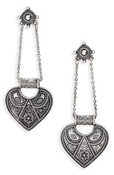 Shop Kitsch Heart Drop Earrings In Burnish Silver