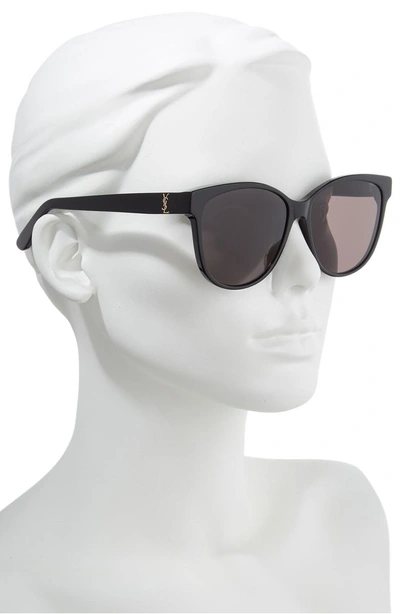 Shop Saint Laurent 58mm Cat Eye Sunglasses - Black/ Black