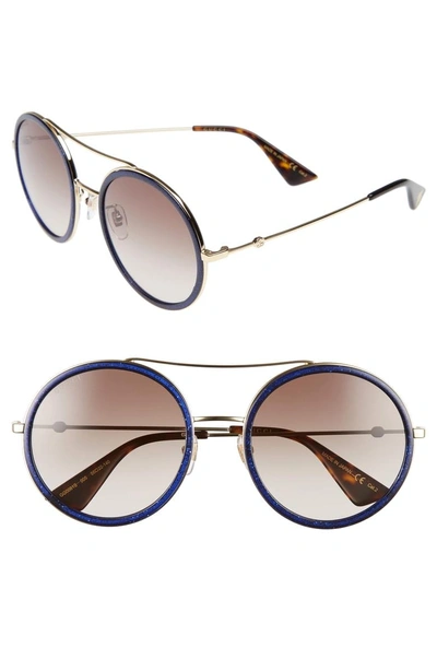 Shop Gucci 56mm Round Sunglasses - Glitter Blue/ Brown
