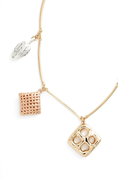 Shop Tory Burch Snack Charm Necklace In Brass / Silver / Rose Gold