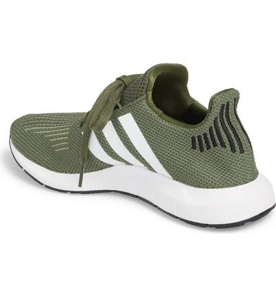 Shop Adidas Originals Swift Run Sneaker In Base Green/ White/ Black