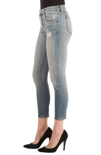 Shop J Brand 835 Distressed Capri Skinny Jeans In Nolita