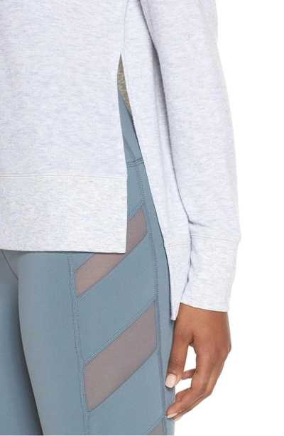 Shop Alo Yoga 'glimpse' Long Sleeve Top In Vapor Grey Heather