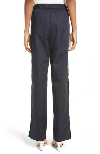 Shop Tibi Snap Side Track Pants In Navy/ Green Multi